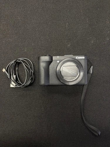 CANON POWERSHOT V1 WITH BATTERY AND CHARGER
